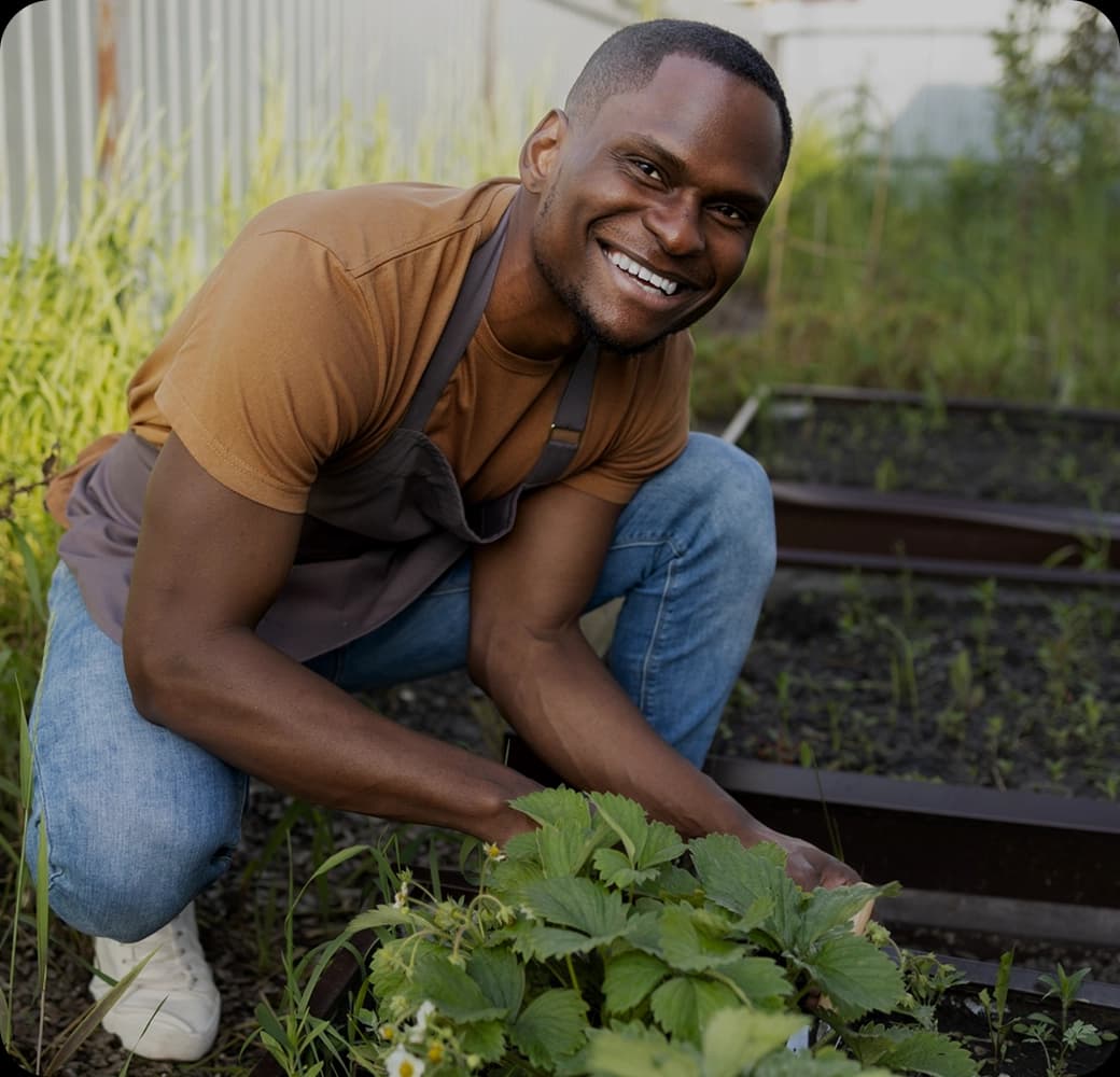 Agripreneur tending crops on a farm