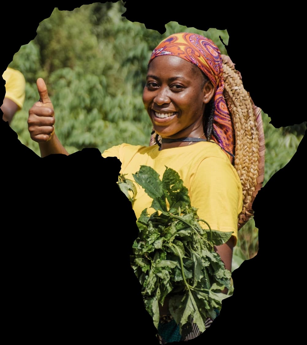 Agripreneur giving a thumbs-up while holding fresh produce, masked inside an Africa silhouette